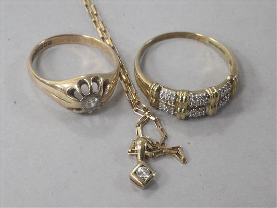 Two 9ct gold and diamond rings and a similar pendant on chain.